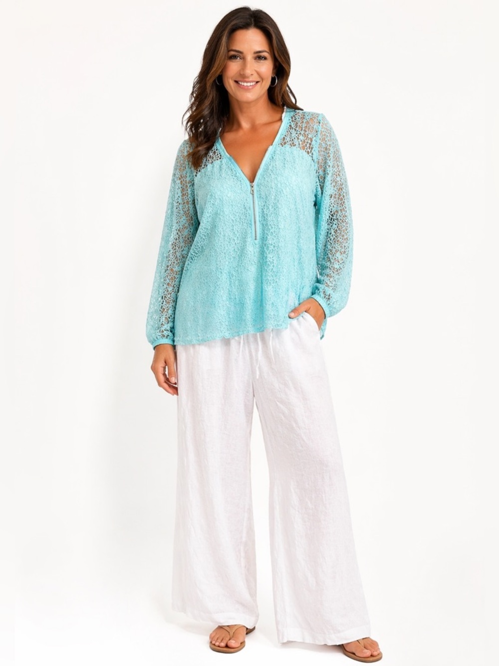 22” pit to pit length 25” gorgeous Calvin Klein aqua blue blouse. Zipper v-neck